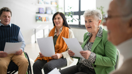 a group of seniors in a meeting