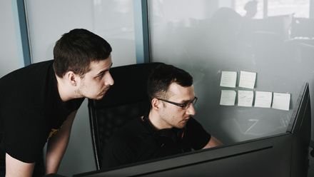 Two men talking about action