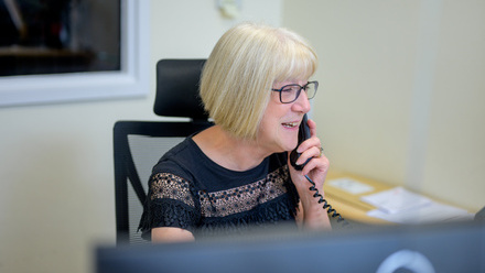 woman on the phone at work