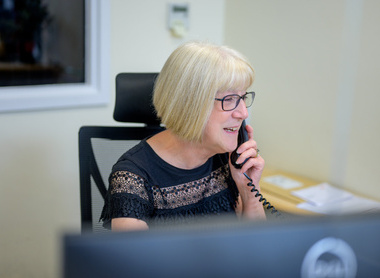 woman on the phone at work