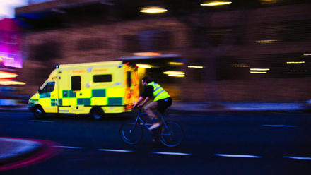 ambulance and biker