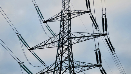 power line against a cloudy sky