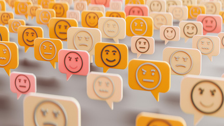 a group of speech bubbles with faces representing customer satification