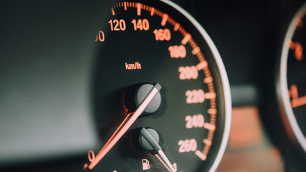 mileage dial on car dashboard